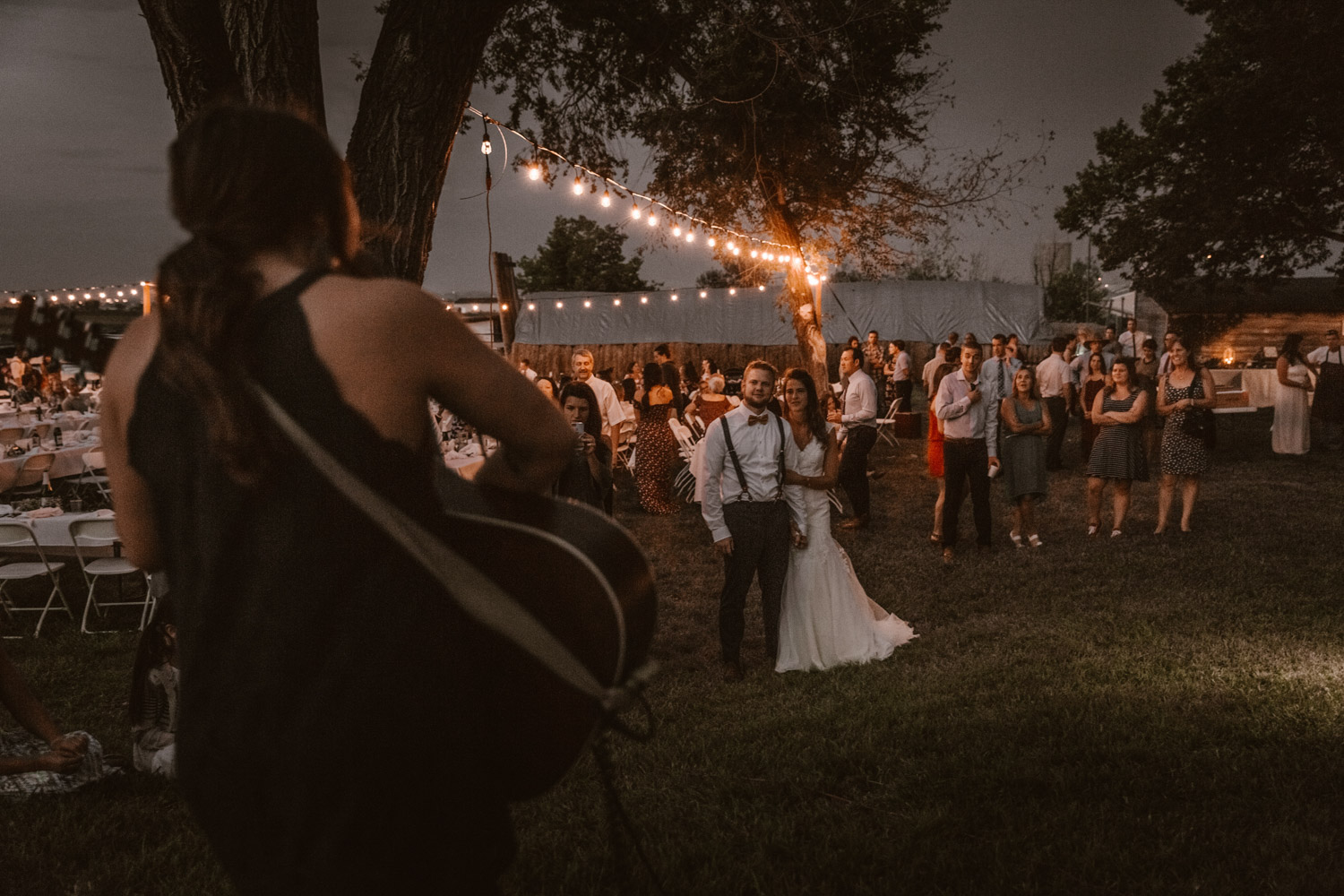 Swiss destination wedding photographer Colorado Denver Vintage Wedding barn wedding light bulbs