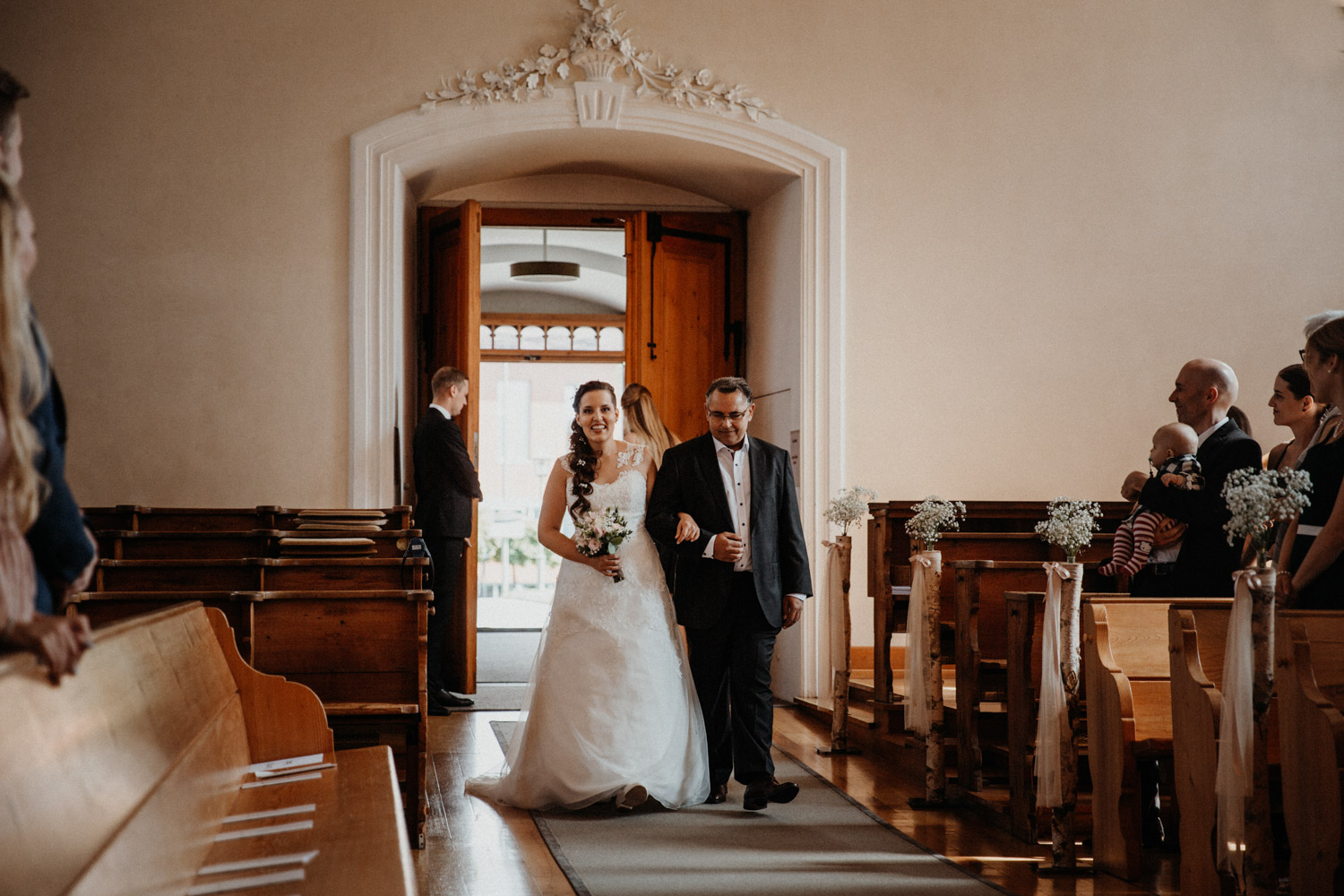 Wedding photographer in Switzerland church wedding bride father