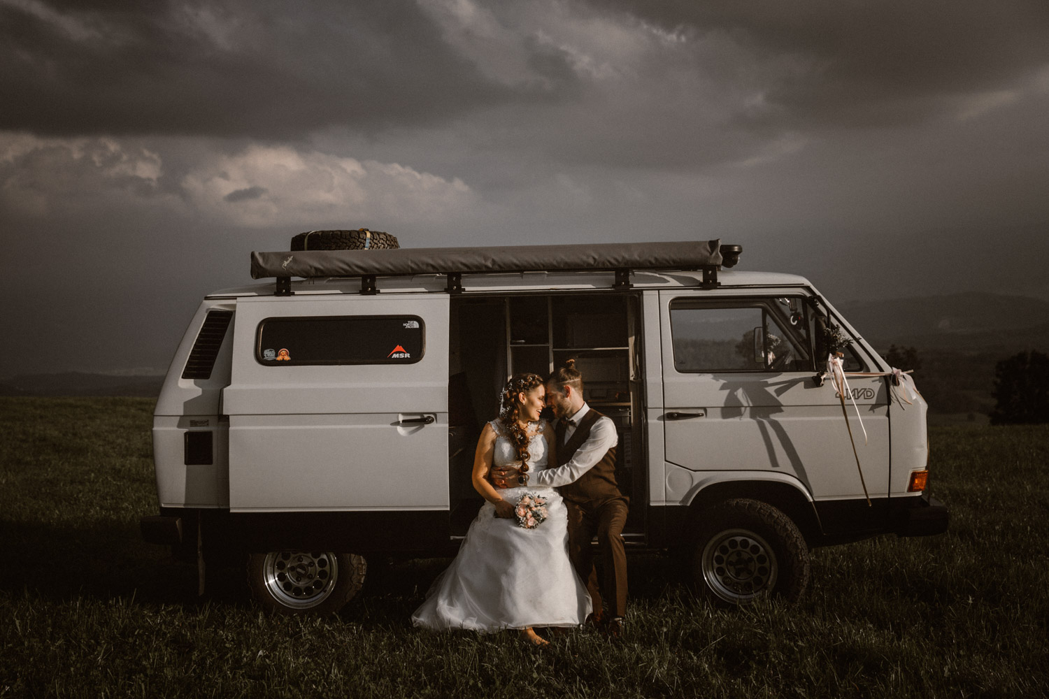 Wedding photographer in Switzerland church wedding bridal couple session hippie bus