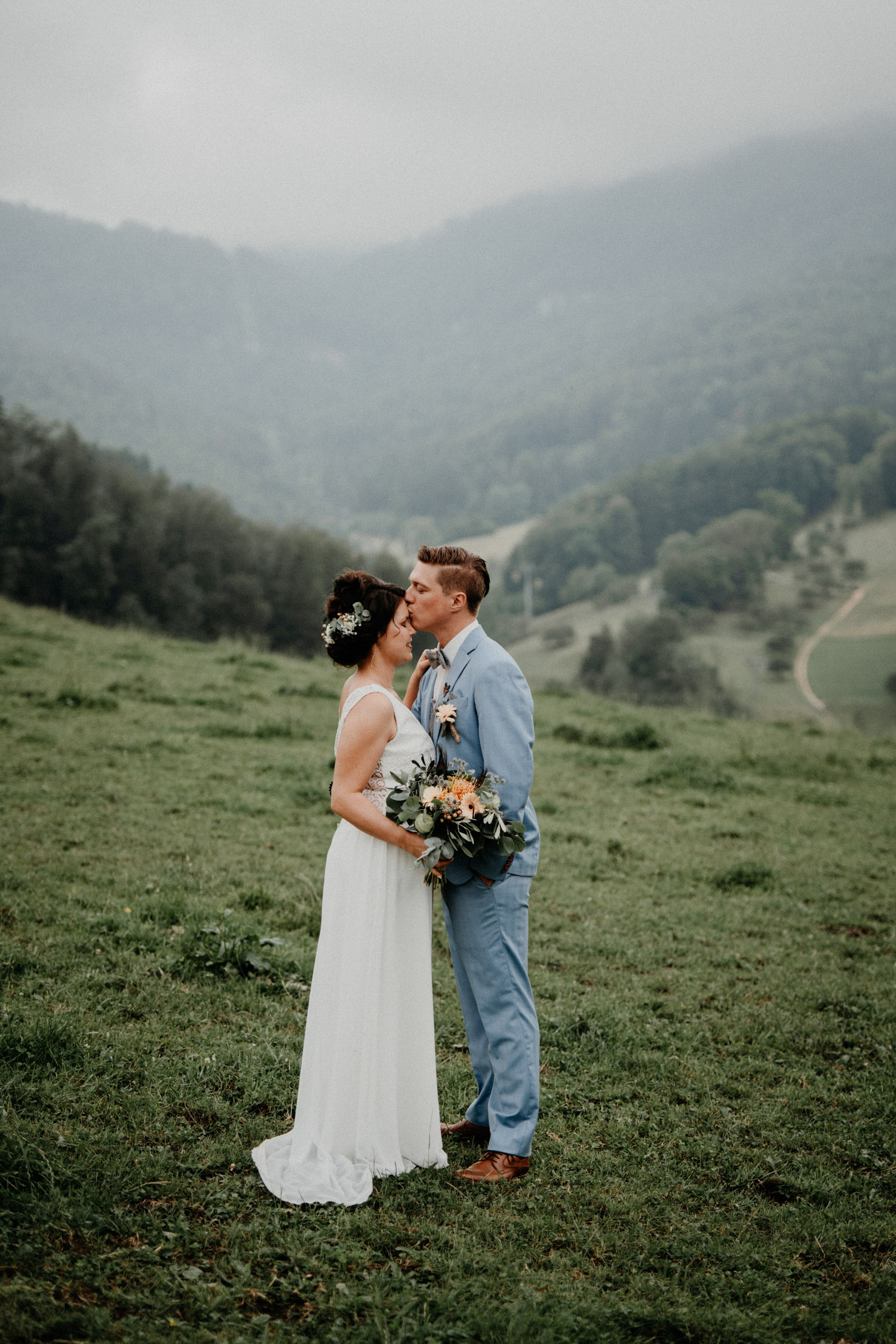 Vintage Industrial Bohemian Wedding in Switzerland wedding photographer elopement photographer getting ready bridal couple shooting swiss mountains