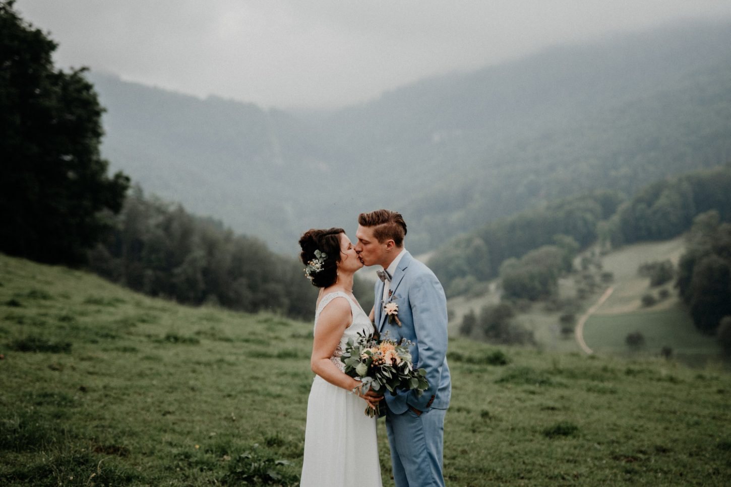 Vintage Industrial Bohemian Wedding in Switzerland wedding photographer elopement photographer getting ready bridal couple shooting swiss mountains