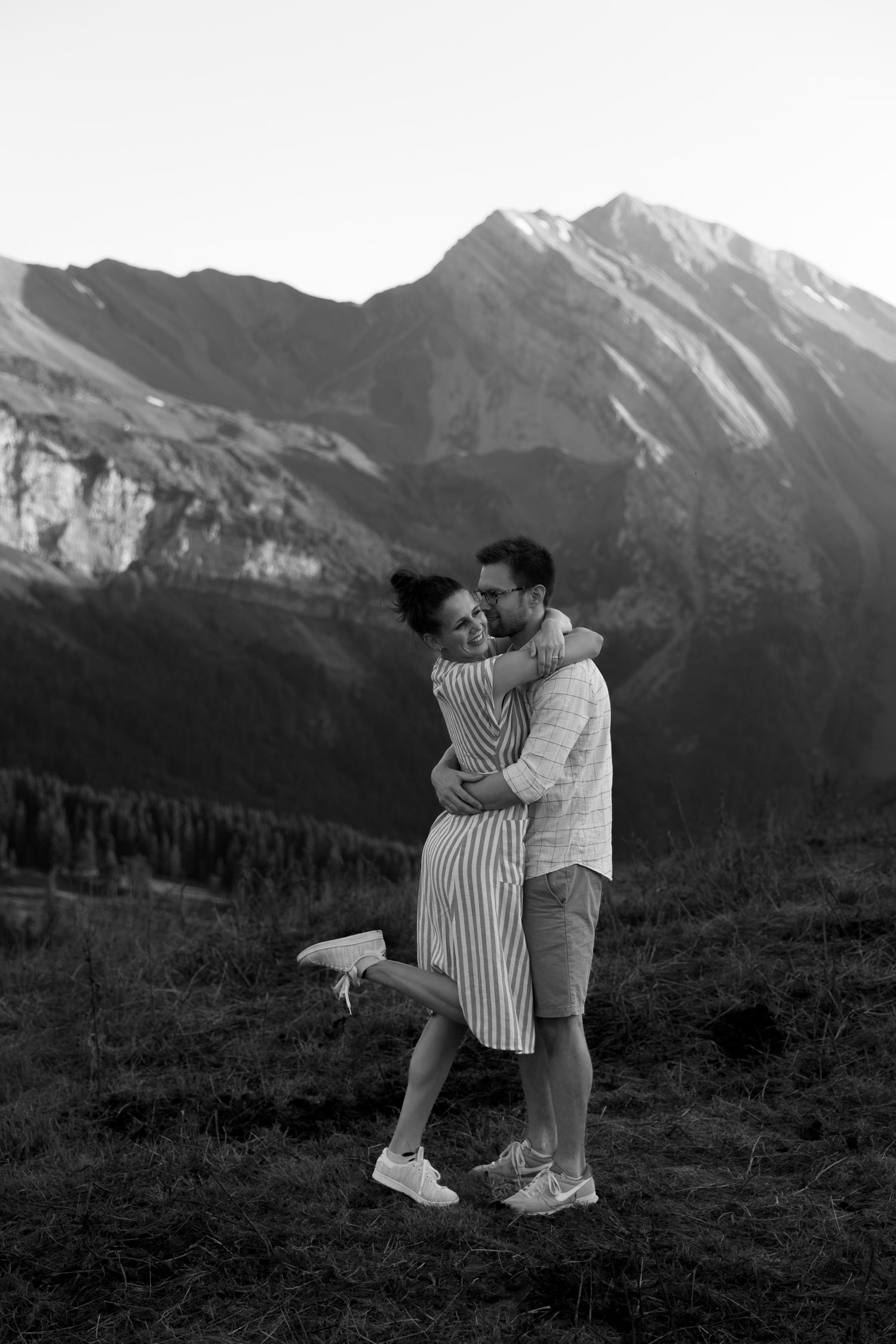 couple hugging in the Swiss alps photographed by Swiss elopement photographer