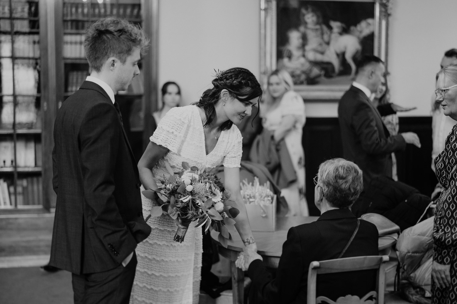 A bride talks to her old grand mother at a urban wedding in Basel, Switzerland