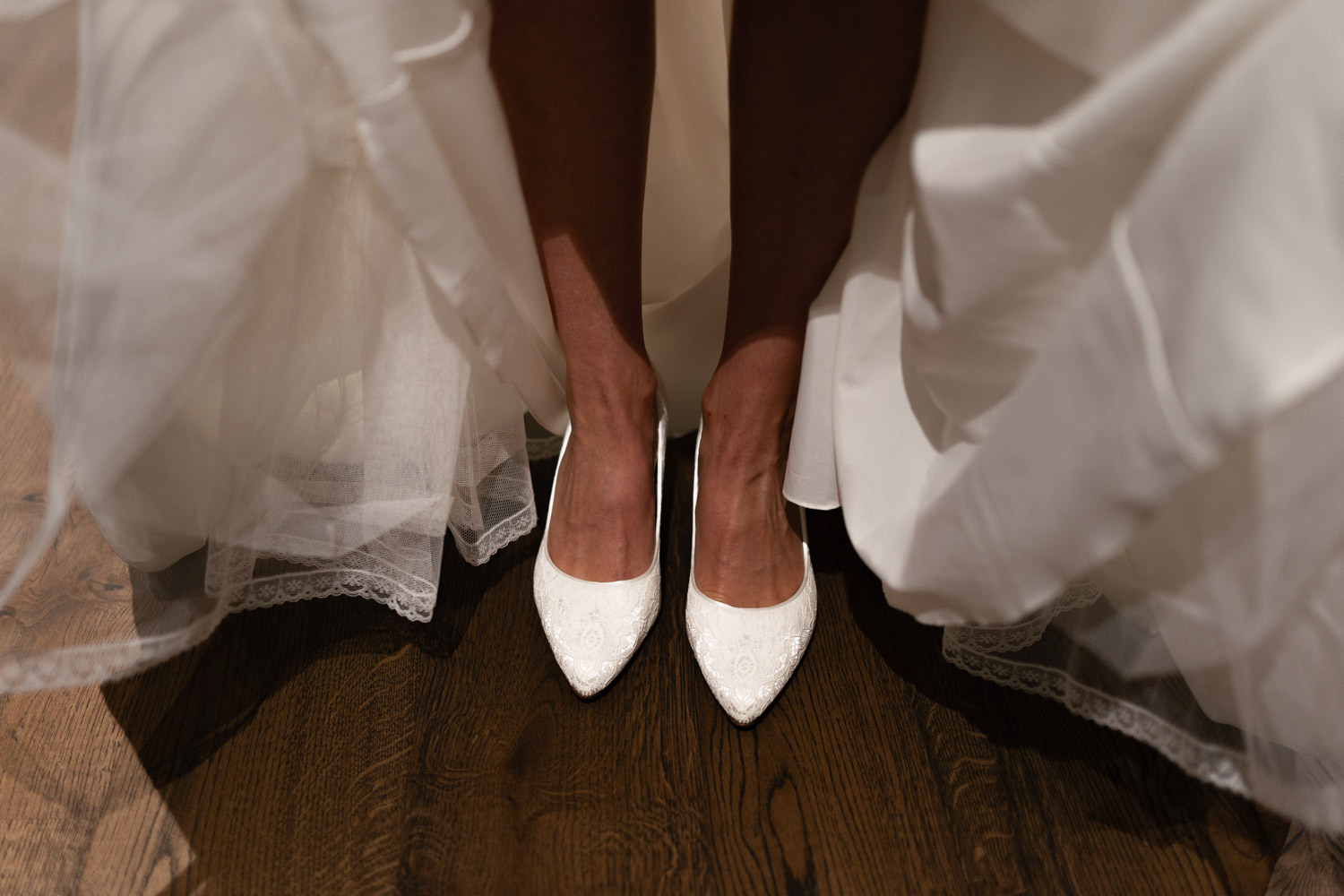 Bride in her shoes after getting ready for Villa Honegg Wedding, photographed by wedding photographer